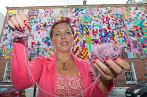 Aine Clarke of Hansel and Gretel with the massive City of Culture quilt