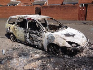 A family estate car burned out on the Albertbridge Road in east Belfast after rioting on Tuesday night