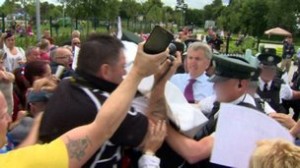 Police had to escort Belfast's Sinn Fein Lord Mayor Mairtin O'Muilleoir from Woodvale last month