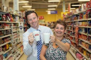 COFFEE BREAK... Maria Losty from Robert Roberts joins Steven Murphy, Buying Manager of Tesco Northern Ireland, as the local tea and coffee company secured a deal to supply its new Dark Roast Shipyard Strength coffee to the retail giant.