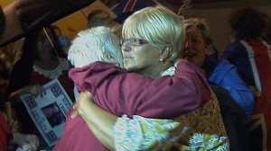 Ruth Patterson is hugged by her mum as she leaves Musgrave Street police station