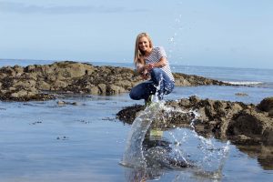 Former Miss NI Tiffany Brien gets in some practice for the World Stone Skimming Championships. PIC: Presseye