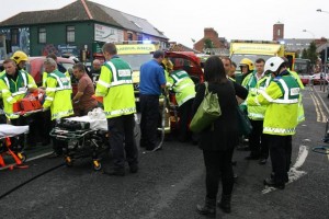 Paramedics and doctors at the scene of west Belfast crash which left 10 people injured