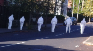 Forensic experts comb the scene at Lawrence Hill in Derry after failed mortar bomb attack