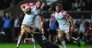 Ulster's Dan Tuohy brushes off an Osprey's tackle at the Liberty Stadium