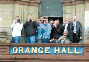 EYE SPY...Winky Irvine (thrid left) watching from the top of Ligoniel Orange Hall