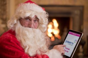 Santa ensures he'll return to a bright home this Christmas by topping up his electricity using Power NI's free Keypad app whilst taking a break at the Culloden Hotel. Pic  Brian Morrison