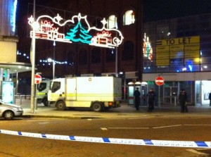 Army bomb squad officers at Cornmarket on Monday night after a firebomb ignites