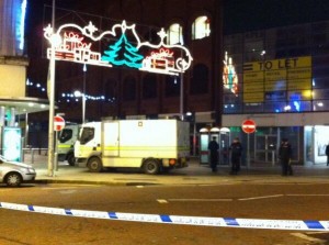 Army bomb squad officers at Cornmarket on Monday night after a firebomb ignites