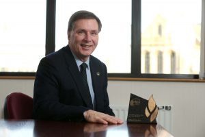 Alan Clarke is pictured with his Honorary Fellowship Award from Belfast Metropolitan College.