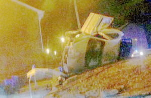 Three police officers miraculously escaped injury when their car crashed