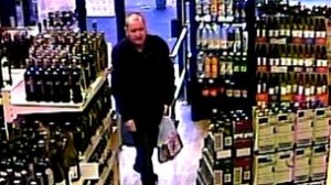 Basil McAfee shopping in an off licence on December 19 hours before he was murdered