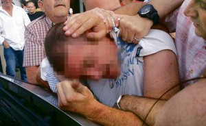 The moment Anthony Campbell is detained by customers at Kelly's Cellars