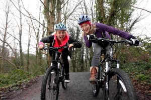 Winter Olympic Snowboarder Aimee Fuller, who lives in Northern Ireland, along with the Northern Ireland Tourist Board’s Julie McLaughlin take to their bikes at the Barnett Demesne Mountain Bike Trail, 