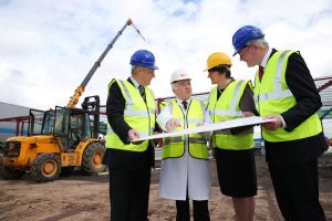 First Minister Peter Robinson and deputy First Minister Martin McGuinness are pictured with Enterprise Minister Arlene Foster and Delta Print & Packaging Chairman and joint Managing Director, Terry Cross. Delta Print & Packaging is investing £40 million in its west Belfast plant, Picture by Kelvin Boyes / Press Eye