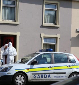 Forensic experts at the scene of death at house party