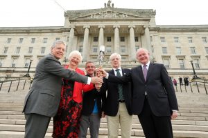 The Queen’s baton for the Commonwealth Games was presented to Northern Ireland's First Minister, Peter Robinson MLA and deputy First Minister, Martin McGuinness MLA by Dame Mary Peters. Also pictured is Chris Jenkins, Chief Executive, Commonwealth Games and Robert McVeigh, Chairman of Commonwealth Games NI. PIC: PRESSEYE