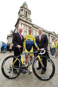 First Minister Peter Robinson and deputy First Minister Martin McGuinness pictured with Elite cyclist Nicholas Roche at the Giro d'Italia opening ceremony at the City Hall. 
