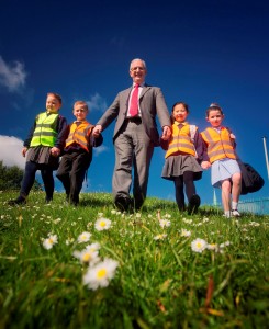 Transport Minister Danny Kennedy joined school children Rachel Lewis, Corey Otter, Etta Choi and Madison Doyle at Abbott’s Cross Primary School in Newtownabbey as they put their best feet forward for Walk to School Week 2014, which is taking place this week (May 19-23).