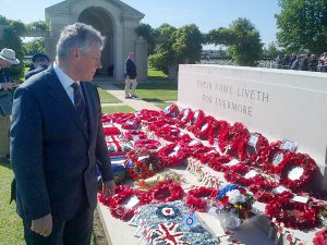 First Minister Peter Robinson has attended the 70th D-Day commemorations in Normandy. He is pictured following a service at Bayeux Cemetry. PIC: PRESSEYE