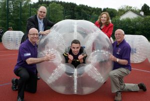 Getting the ball rolling for the Newtownbutler Together Peace Impact Project are (back row)Greg Burton, US Consul General; Dorothy Clarke, International Fund for Ireland Board Member; and (front) Newtownbutler Together representatives Bert Robinson, Simon Wiggins and Cllr Thomas O’ Reilly.