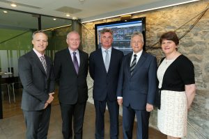 Peter Robinson and Martin Mc\Guinness pictured with Brian Conlon, CEO, First Derivatives plc, centre, and Kevin Cunningham (MRP), far left, and Enterprise Minister Arlene Foster.