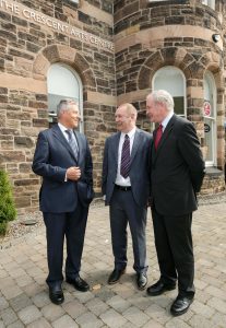 Peter Robinson and  Martin McGuinness pictured with Padraic Quirk, Atlantic Philanthropies 