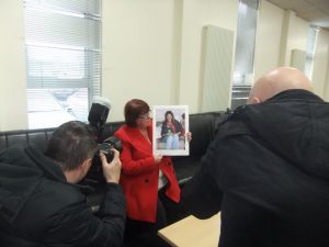 Nora Darling holds up a pic of missing grand daughter Leonita Teague