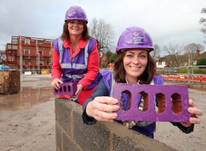 Priscilla Roche, whose son was cared for by NI Hospice last year, joins Lord Mayor of Belfast Nichola Mallon at the Somerton Road construction site as the charity reaches a major milestone in its journey to rebuild the adult Hospice in North Belfast.