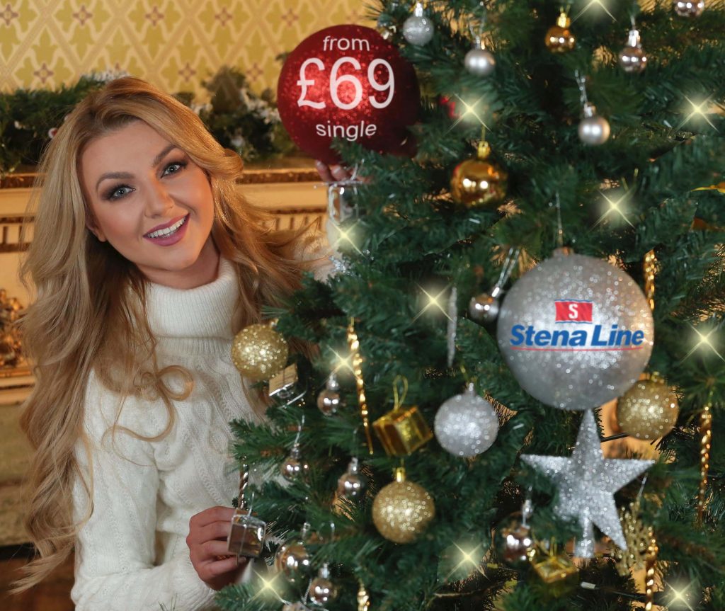 LOVELY BAUBLES....Model, Meagan Green, grabs Christmas by the baubles as ferry company Stena Line sees the lighter side of the festive season by giving gushy ads the heave-ho-ho-ho in favour of humour instead