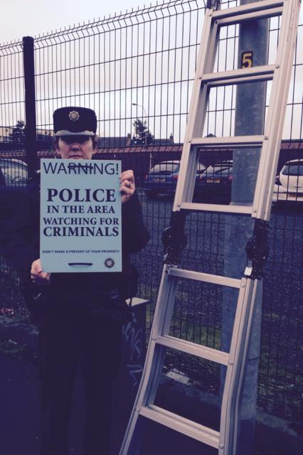 Constable Fiona Rogan with the signs erected to warn motorists of thieves on the prowl 