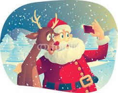 Smile for the camera Rudoph...Santa gets a selfie with the most famous reindeer