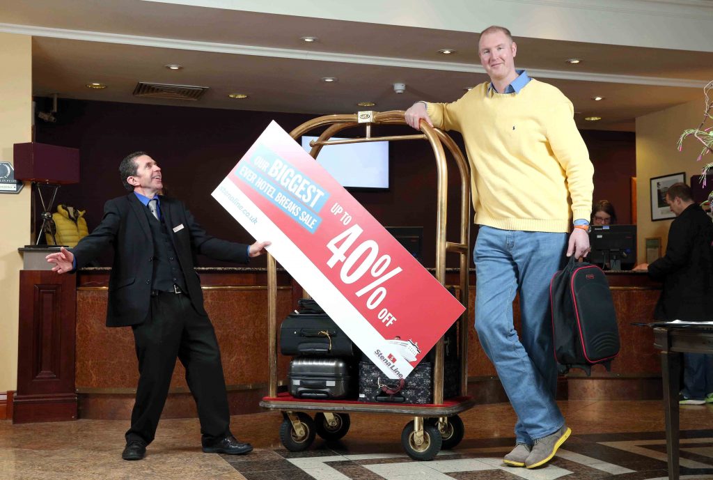 EUROPES tallest man, Neil Fingleton, who stands at a staggering 7 7 ¾ sailed into Northern Ireland today to reveal details of ferry company Stena Lines biggest ever hotel breaks sale 