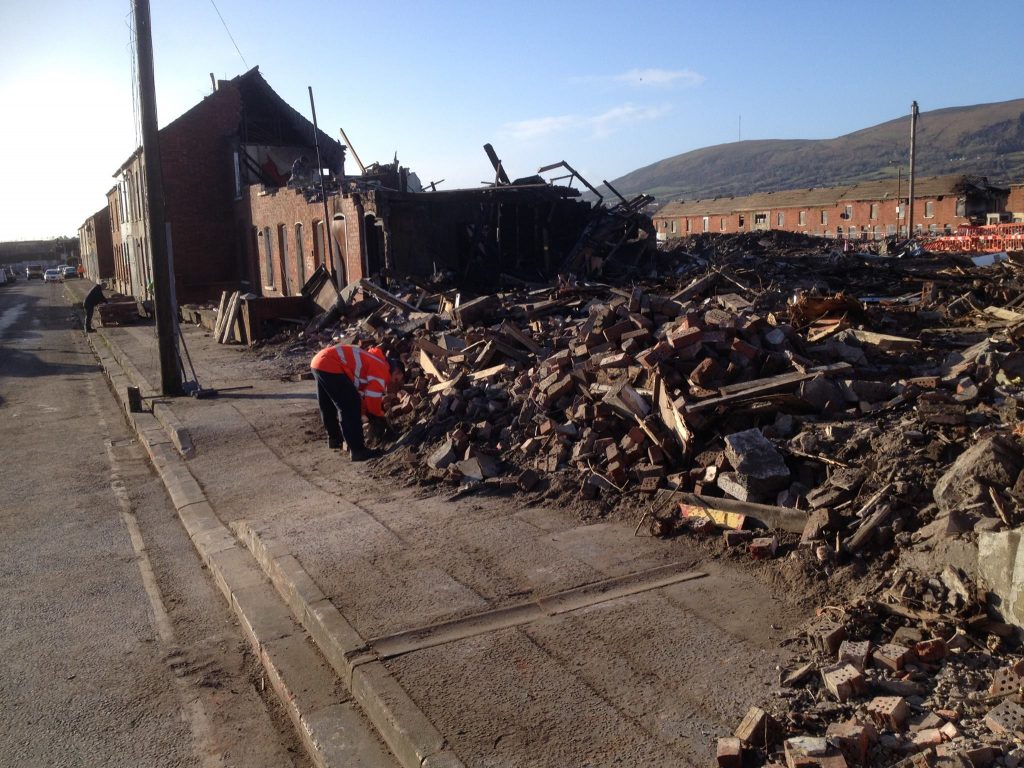 The aftermath in Lawnbrook Avenue after walls collapsed in the derelict Shankill homes