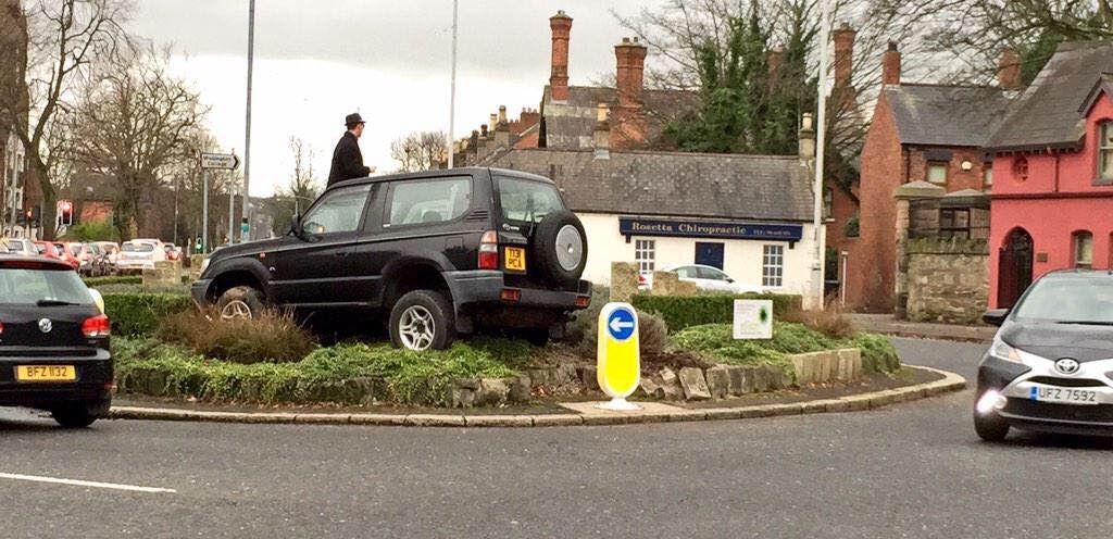 'Johnny The Wally' lands his jeep on a Belfast roundabout looking for a parking space