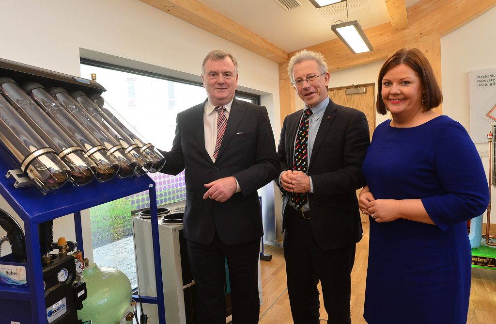 Pictured at the official opening of the Centre for Renewable Energy and Sustainable Technologies (CREST), IrelandÕs largest green technology research and development and training facility in Enniskillen are Malachy Mc Aleer, Director, South West College; Chris Hines MBE, former Sustainability Director at the Eden Project Cornwall and Jill Cush, Innovation Centre Manager