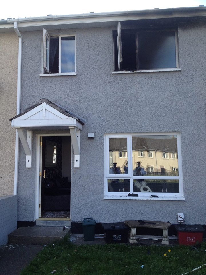 The house in the Shankill's Malvern Way extensively damaged in arson attack. PIC: Brian Kingston