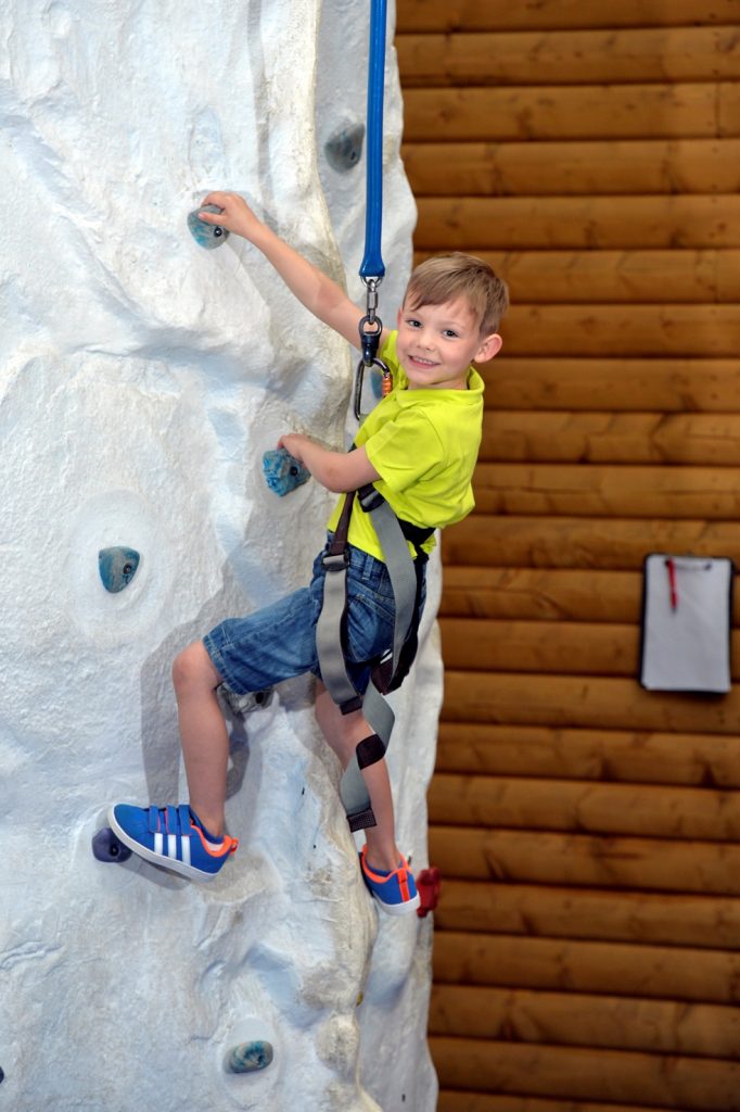 Ned McNally (6) tries his hand at the climbing wall in We Are Vertigo as the Belfast-based trampoline park and adventure centre launches its biggest summer camp to date. 