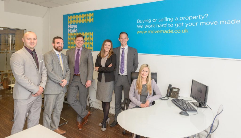 Pictured : Dermot O'Hanlon and Gavin McEvoy, Directors of Move Made, centre, join staff at the office of the new business, Move Made.