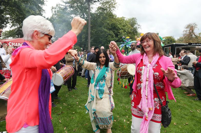 Junior Minister Jennifer McCann joins thousands of people celebrating this years Mela in Botanic Gardens. Organised by Arts Ekta, the Mela is the annual, and arguably the biggest, intercultural festival in Belfast with food, music, dance and arts from across the globe. Also pictured is Nisha Tandon and Pamela Ballantine from Arts Ekta. Picture by Kelvin Boyes / Press Eye .