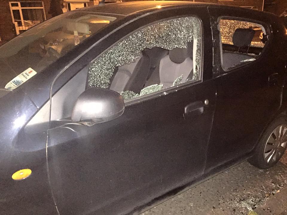 One of the cars damaged in a sectarian attack in north Belfast on Friday night