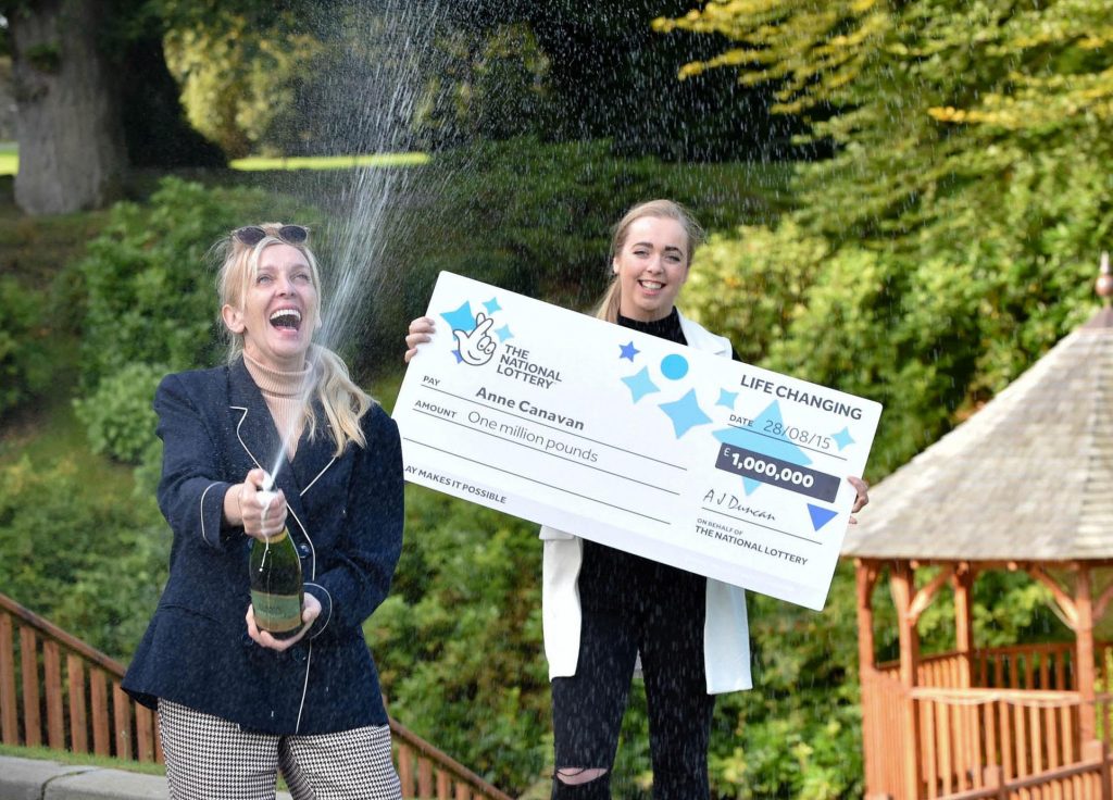 CHAMP-ANNE!!! inventor Anne Canavan and daughter Cressida celebrate after the mum of four became Northern Irelands latest National Lottery millionaire. Not only did Anne scoop a life-changing £1 MILLION in the EuroMillions Mega Friday Draw, but she will also sail away with an exclusive luxury Private Island Getaway for herself and her four children on the tropical paradise of Song Saa Island in Cambodia. PHOTO TAKEN BY SIMON GRAHAM / HARRISON PHOTOGRAPHY.