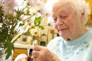 Lady flower arranging