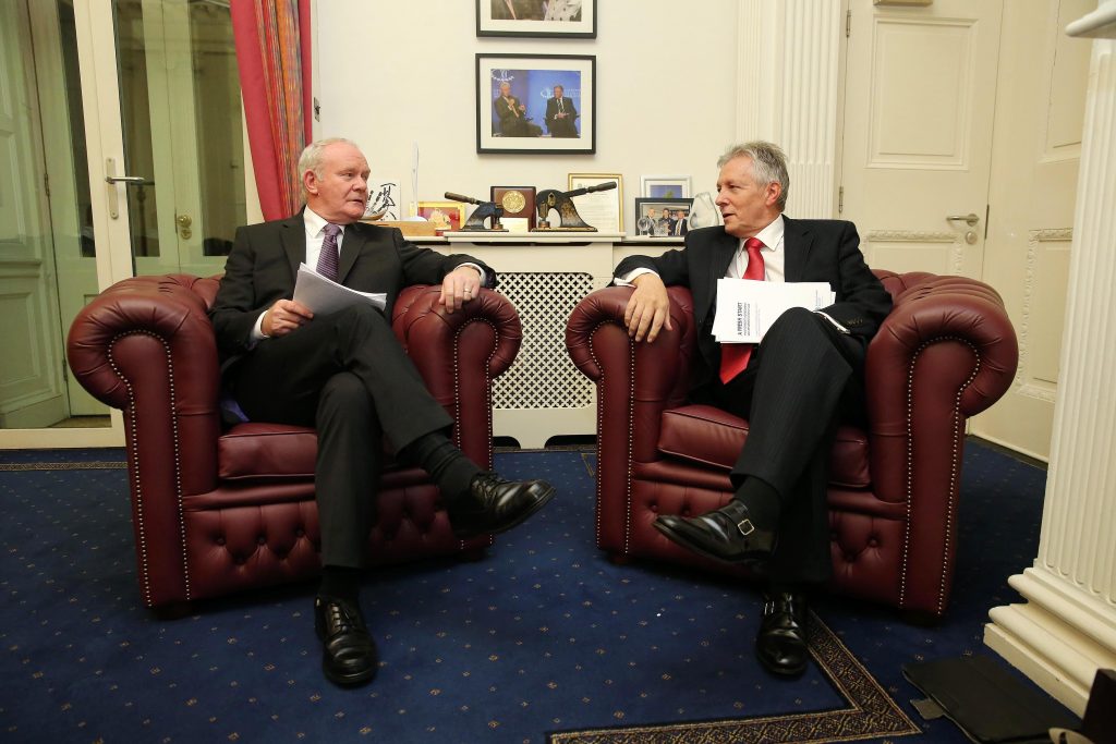 First Minister Peter Robinson and deputy First Minister Martin McGuinness sign the copy of the document 'A Fresh Start - The Stormont Agreement and Implementation Plan' pictured at Stormont Castle where they also held a news conference this afternoon.  Picture by Kelvin Boyes / Press Eye.