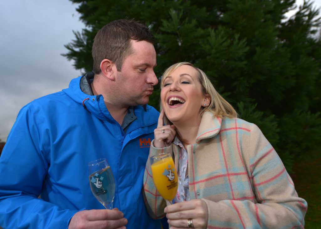 County Armagh man Ross Hearst celebrates £4m scratchcard win with wife Jocelyn.