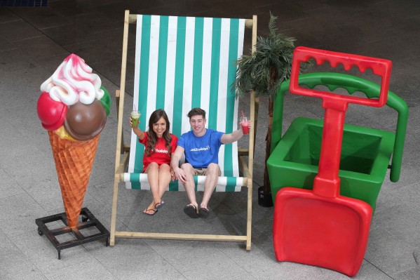 BIG IN BELFAST: Shannon Webster and Ben McDowell put their feet up on a giant deckchair at the launch of Jet2.com and Jet2holidays BIGGEST EVER flights and holidays programme from Belfast International Airport. 