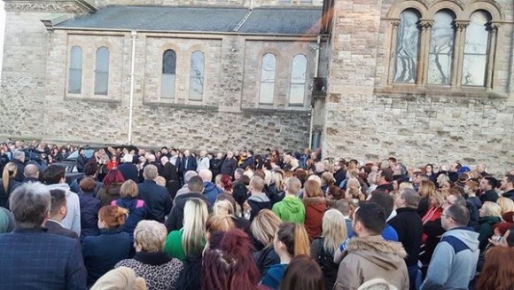 Hundreds of people gather for vigil this evening to support Michael McGibbon's widow Joanne and her children