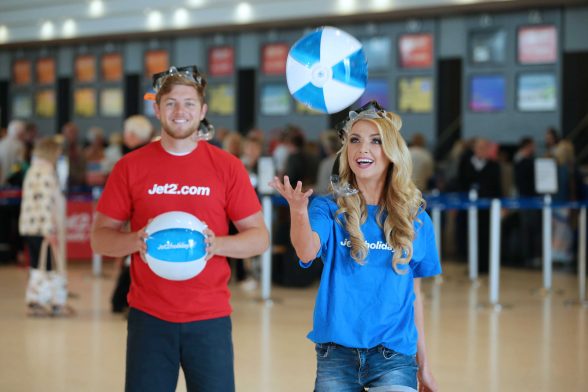 HAVING A BALL: Meagan Green and James Stewart were celebrating the inaugural Jet2.com and Jet2holidays Fuerteventura flight from Belfast International Airport by giving out beach balls to all passengers travelling to the new destination.