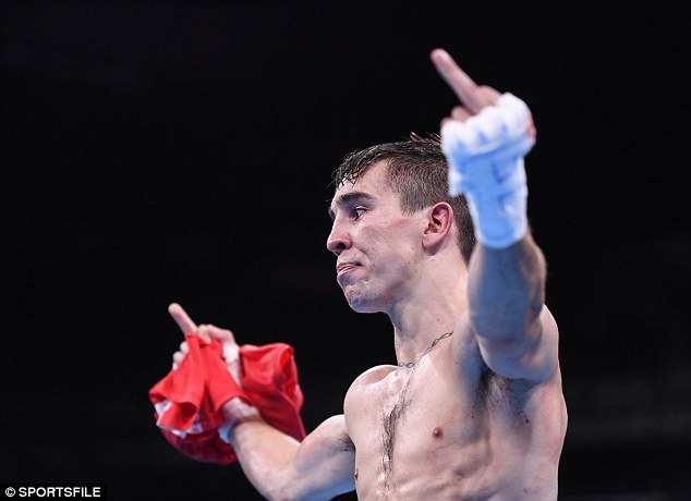 UP YOURS....Boxer Michael Conlan gives the finger in the direction of the judges who bizarrely gave fight to his opponent