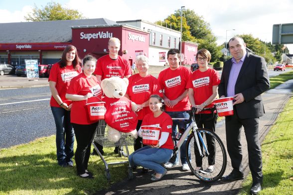 Store Manager Ian Elliott and staff from McCoolÕs SuperValu Ballymoney are putting their best ÔpawÕ forward by taking on an almighty trolley dash Ð 500 miles in 10 days - to raise £10,000 for Action Cancer. Led by an Action Cancer bear mascot, eight members of staff from the popular shop will set out on an arduous walk and cycle around Northern Ireland, calling in at all 34 SuperValu shops in the Province, to raise vital funds for Action CancerÕs Big Bus, which is sponsored by SuperValu and is this year celebrating its 10th birthday. The team will set off from the SuperValu store in Kells on September 10th and after travelling the length and breadth of the country will finish in Belfast on September 19th. To follow the teamÕs journey and offer support, visit SuperValu BallymoneyÕs Facebook page www.facebook.com/supervaluballymoney or go to www.facebook.com/ActionCancer. Store Manager Ian Elliott is pictured with Gillian Thompson from Action Cancer and staff members who are taking part in the trolley dash.